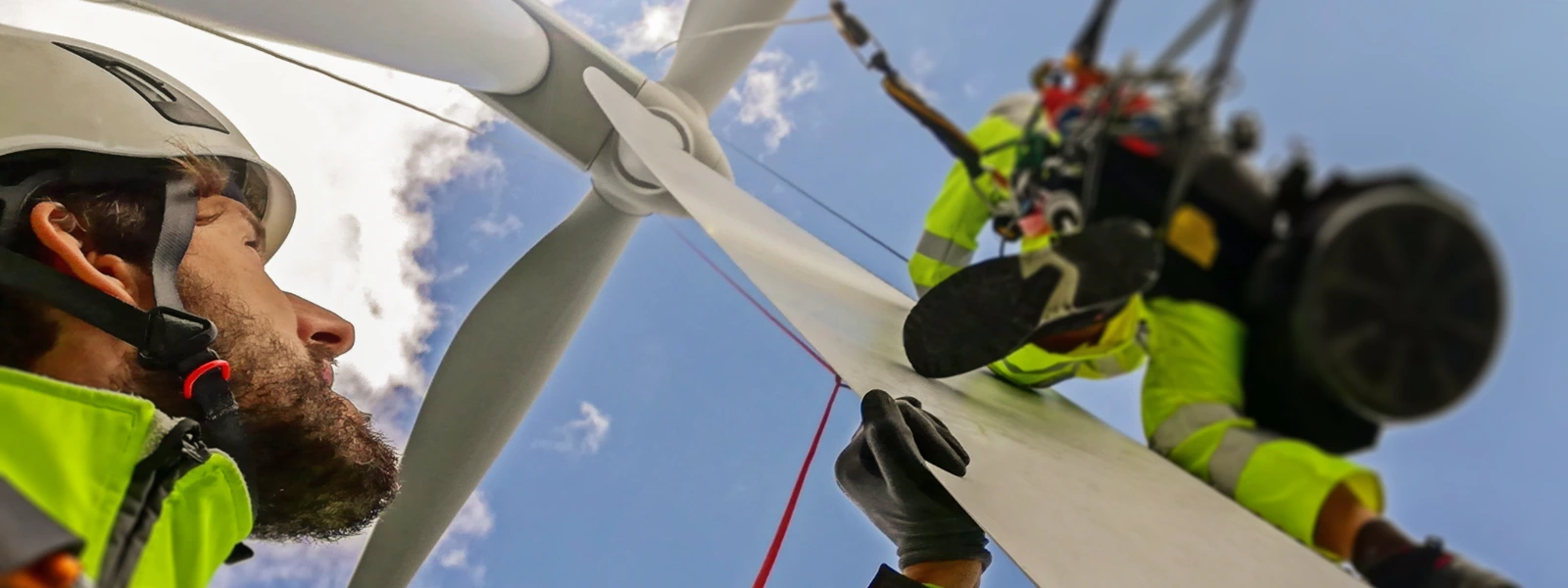 A technician working at height on a wind turbine